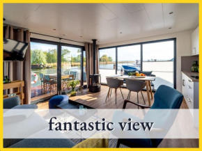 WELL Hausboot 1 - fantastic view with fireplace, barbeque events, sailing tours & beach shuttle service